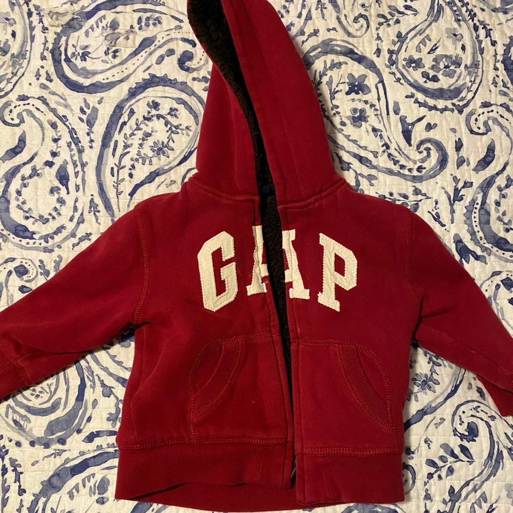 Red zip up thick sweater